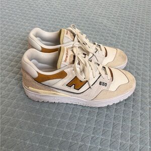 Neutral/yellow New Balance 550s